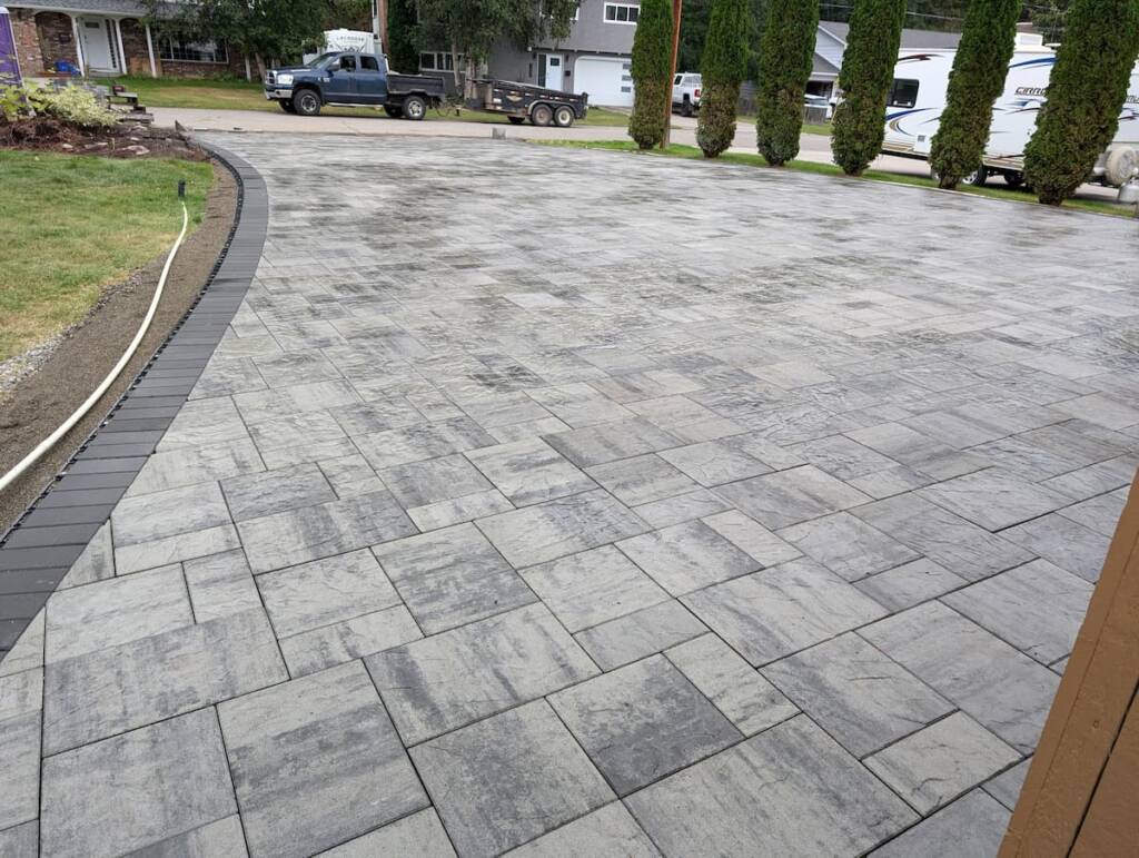 A professional interlocking stone driveway installation showcasing durability and curb appeal in Prince George, BC.